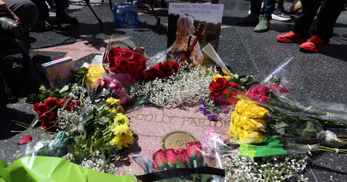 Dolly Parton’s Hollywood Walk of Fame Star Vandalized, Flowers Stolen After Her Death at 80 Dolly Parton’s Hollywood Walk of Fame Star Vandalized, Flowers Stolen After Her Death at 80