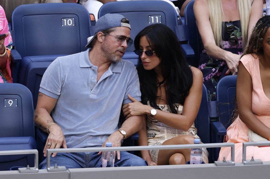 GettyImages-2294446856 Brad Pitt Cuddles Up to Girlfriend Ines de Ramon and Poses for Selfies With Fans at US Open