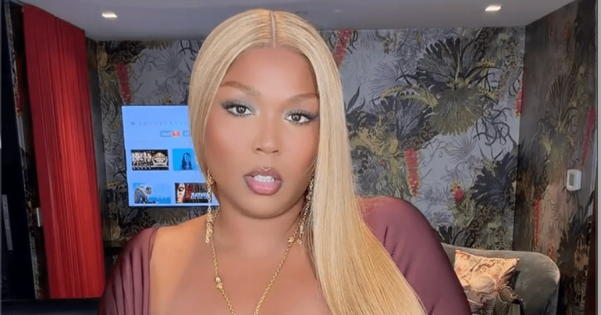 Lizzo Has a Bombshell Moment in a Barely-There Cleavage-Baring Dress With Thigh-High Slit Lizzo Has a Bombshell Moment in a Barely-There Cleavage-Baring Dress With Thigh-High Slit