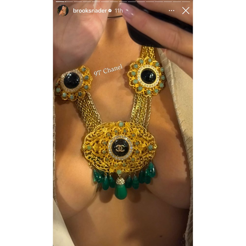 Brooks Nader Nearly Has a Nip Slip While Wearing a Statement Chanel Necklace
