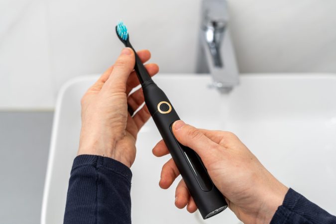 usmagazine.com - Ryan Brennan - Would You Pay $499 for a Toothbrush With a Camera and AI? Here's What Dentists Want You to Know First