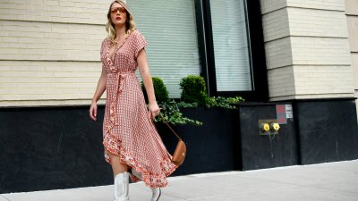 Victoria Jancke is seen wearing a dress and boots from Bootbarn, a bag from Oleada and jewelry from Purelei on September 10, 2022 in New York City.