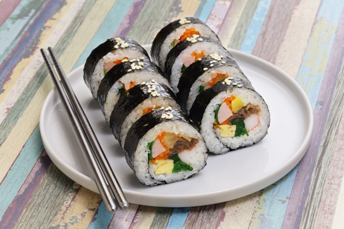 usmagazine.com - Lauren Schuster - Korean Street Food Is Everywhere in American Frozen Aisles, From Kimbap to Mandu and Beyond