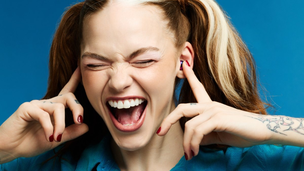 An excited music lover listening to music