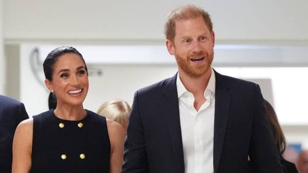 Prince Harry and Meghan Markle Get Cozy Pack on the PDA in 1st Photos Together Since UK Move