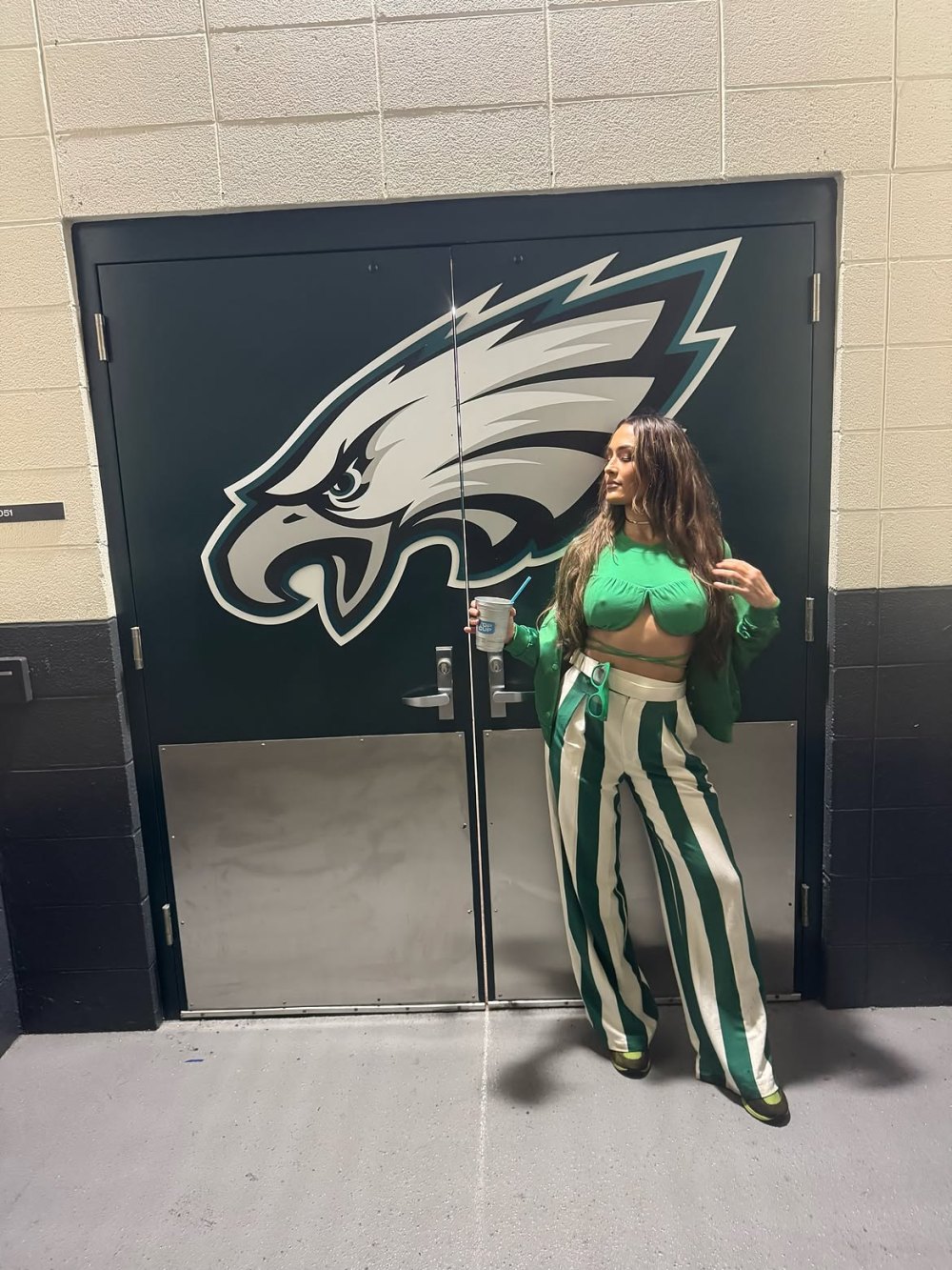 Nikki Bella Goes Braless Under Crop Top at Eagles Game