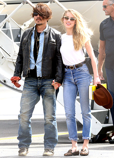 Johnny Piles on for a Flight With Amber Heard