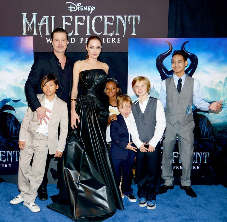 Brad Pitt and Angelina Jolie, with children (left to right) Pax, Zahara, Knox, Shiloh and Maddox Jolie-Pitt, attend the world premiere of Disney's 'Maleficent' in 2014.