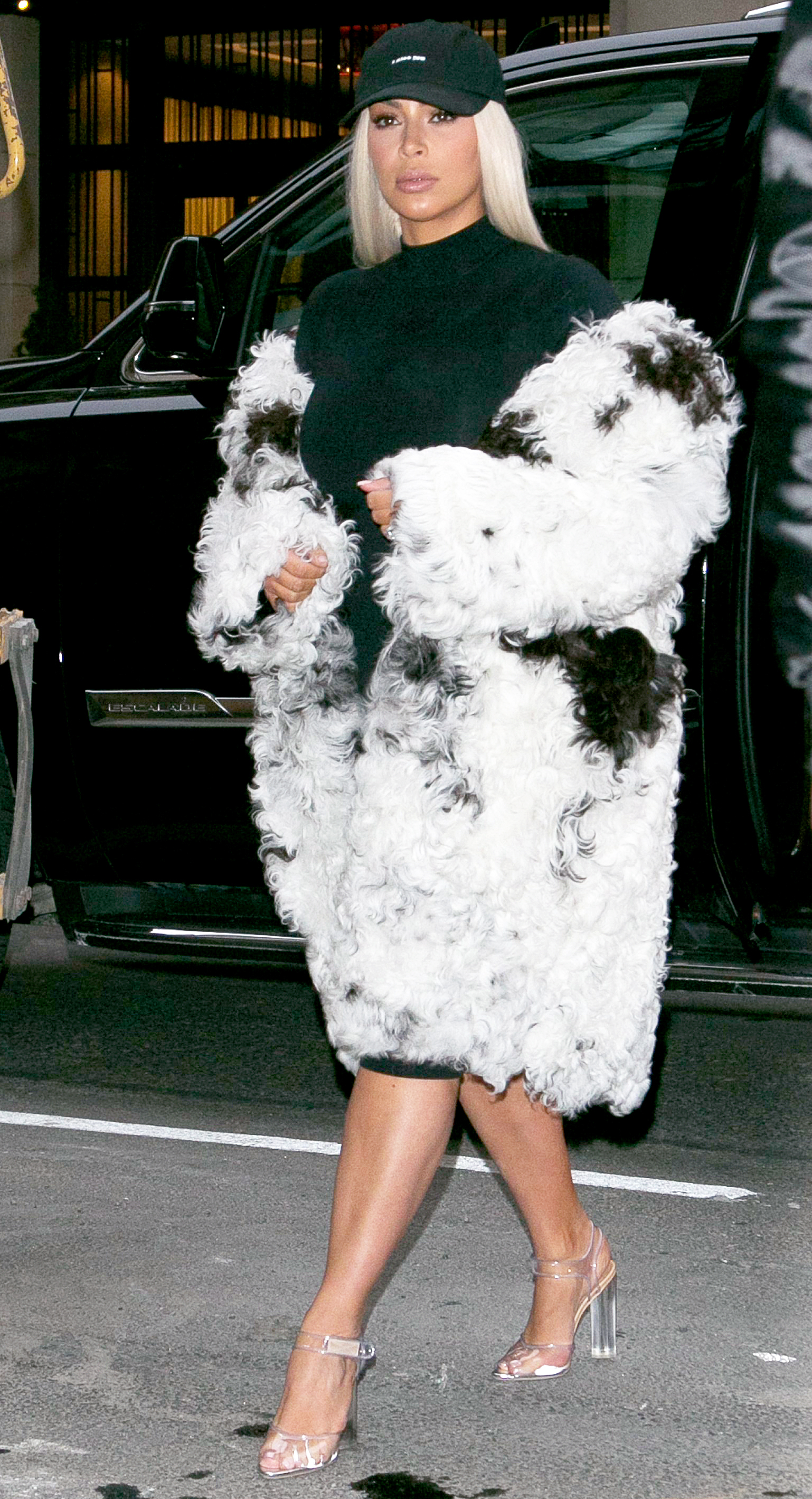 Kim Kardashian Covers Her Post-Baby Body Under Fur Coat