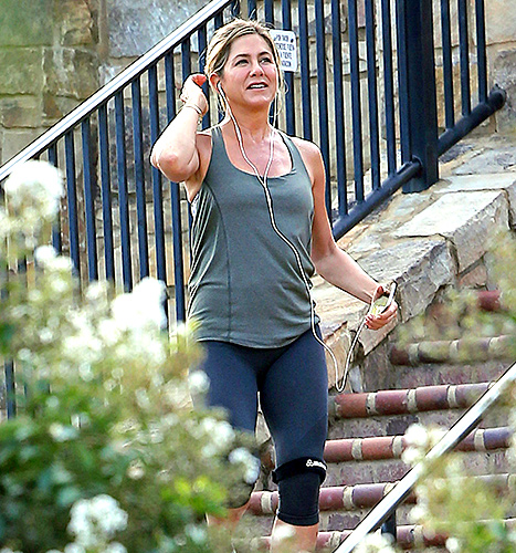 Jennifer Aniston - workout clothes, smiling