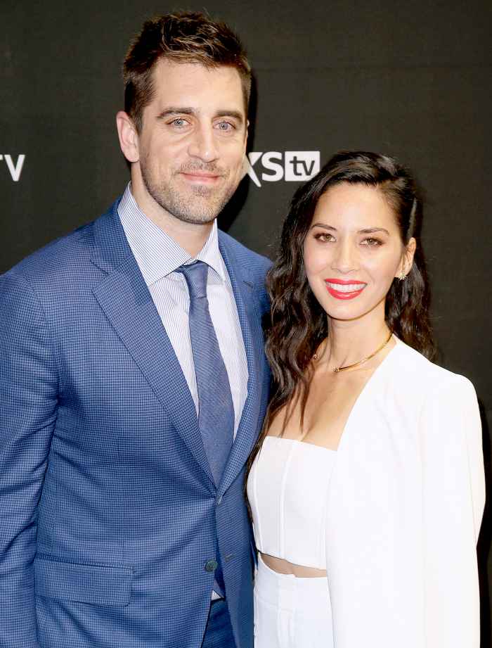 NFL player Aaron Rodgers (L) and actress Olivia Munn attend the DirecTV and Pepsi Super Saturday Night featuring Red Hot Chili Peppers at Pier 70 on February 6, 2016 in San Francisco, California.