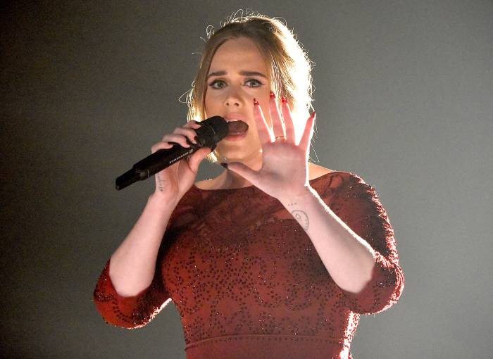 Adele performs onstage during The 58th GRAMMY Awards.