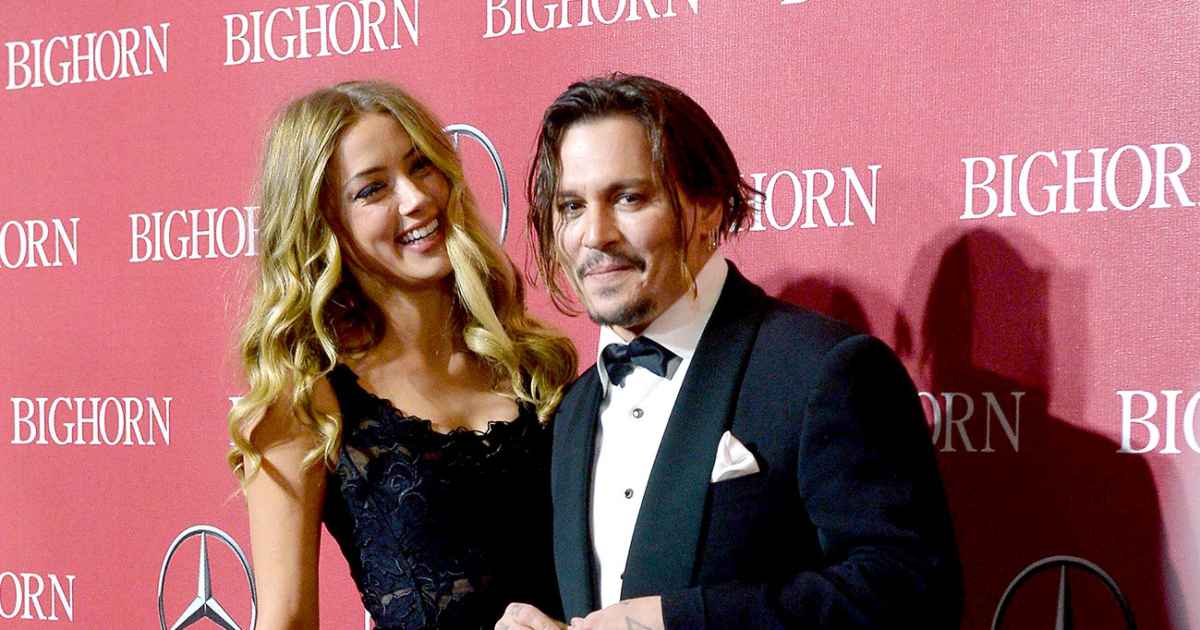 amber heard johnny depp red carpet backless dress Amber Heard on the red carpet for the screening of Two Days, One Night (Deux jours, une nuit) at the 67th international film festival, Cannes, southern France, Tuesday, May 20, 2014. (Photo