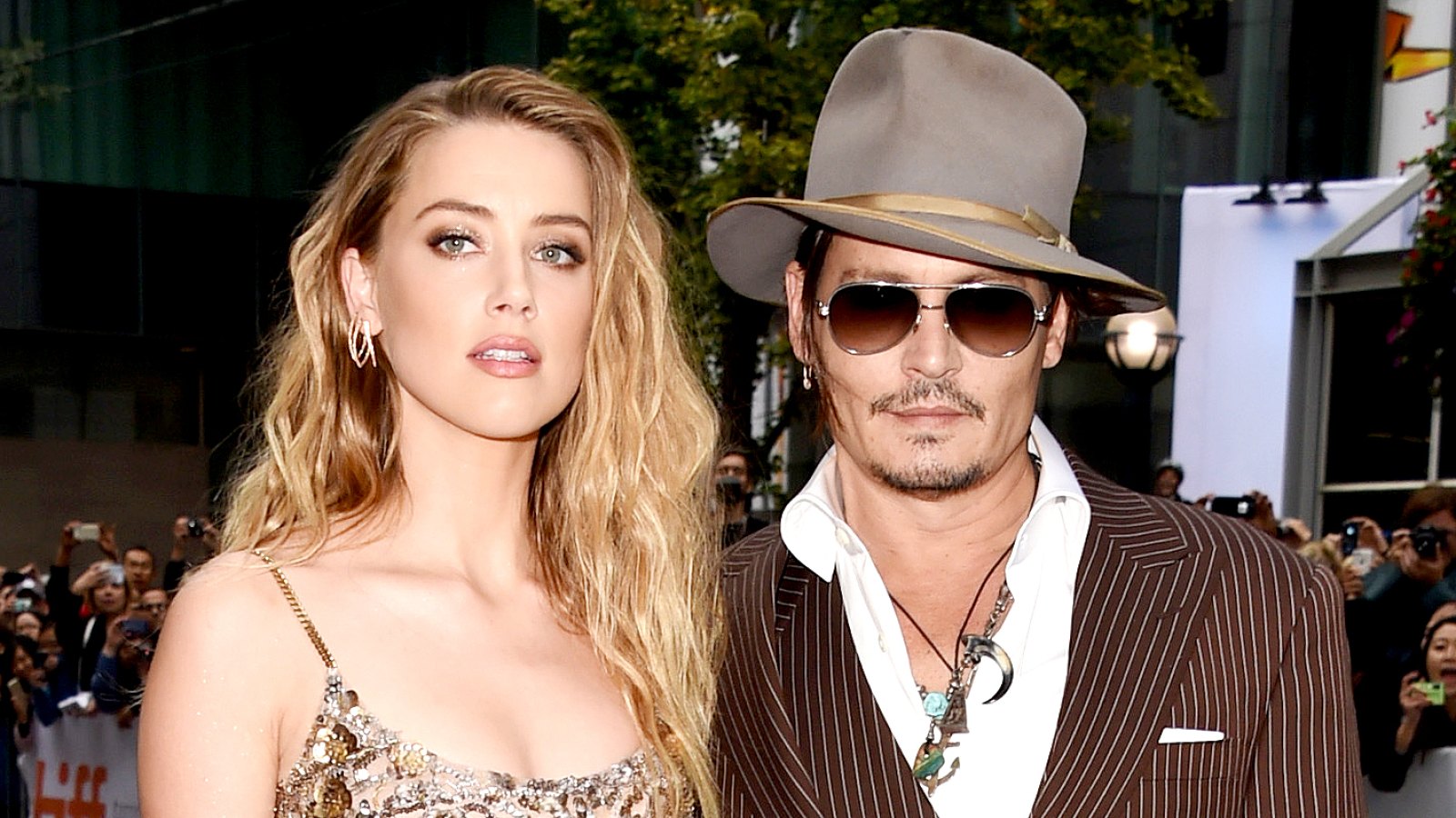 Amber Heard and Johnny Depp attend "The Danish Girl" premiere during the 2015 Toronto International Film Festival.