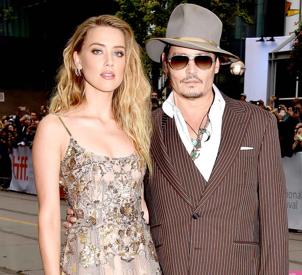 Amber Heard and Johnny Depp attend 'The Danish Girl' premiere during the 2015 Toronto International Film Festival.