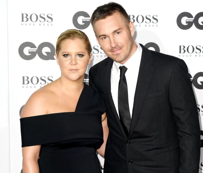 Amy Schumer and Ben Hanisch attend the GQ Men of the Year Awards 2016 on September 6, 2016.