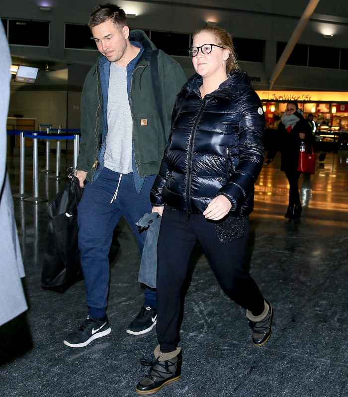 Amy Schumer and Ben Hanisch touch down at JFK airport in New York City on January 9, 2017.