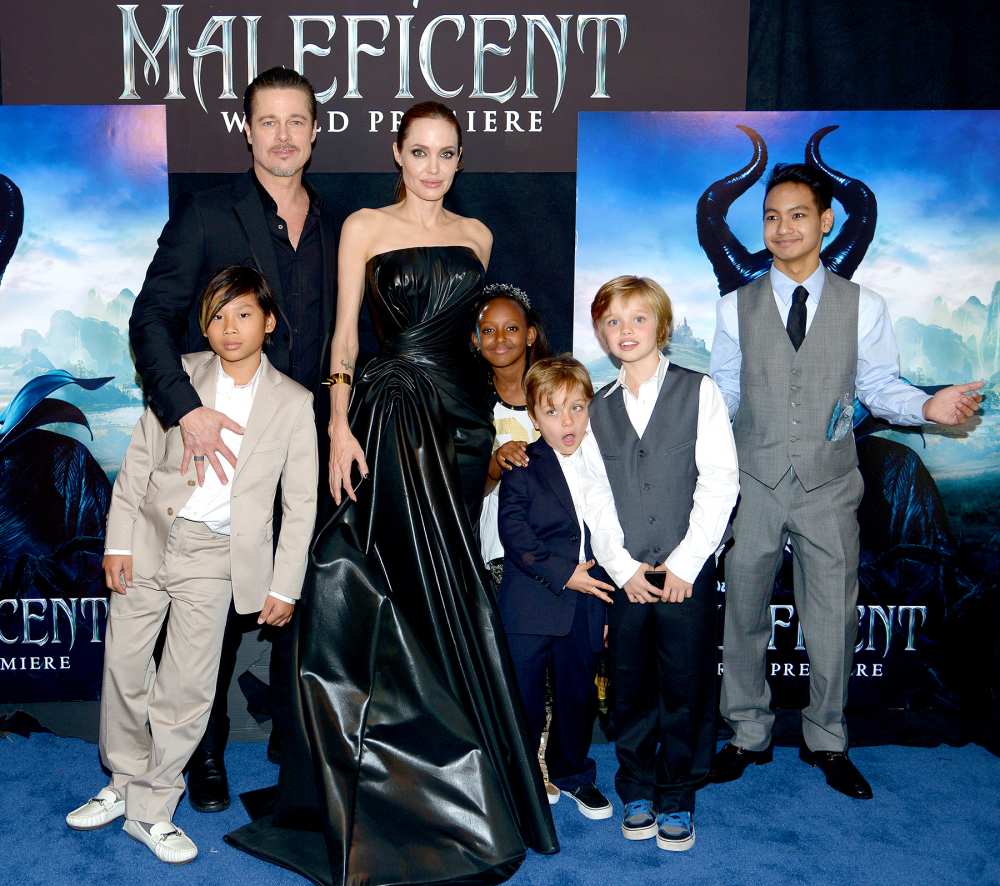 Brad Pitt and Angelina Jolie (C) with children (L-R) Pax Jolie-Pitt, Zahara Jolie-Pitt, Knox Jolie-Pitt, Shiloh Jolie-Pitt and Maddox Jolie-Pitt attend the World Premiere of Disney's