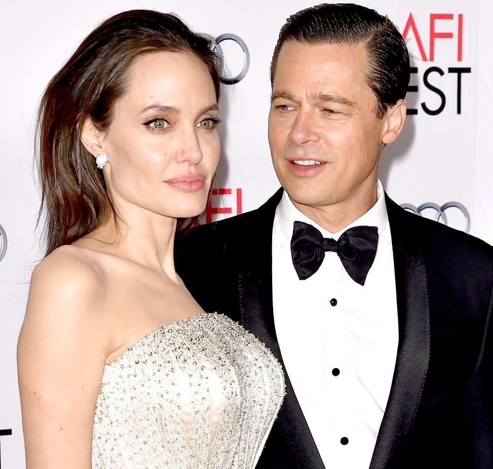 Angelina Jolie and Brad Pitt arrive at the AFI FEST 2015 presented by Audi opening night gala premiere of Universal Pictures'
