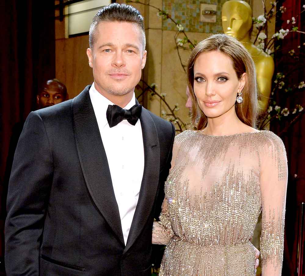 Brad Pitt and Angelina Jolie attend the Oscars held at Hollywood & Highland Center on March 2, 2014 in Hollywood, California.
