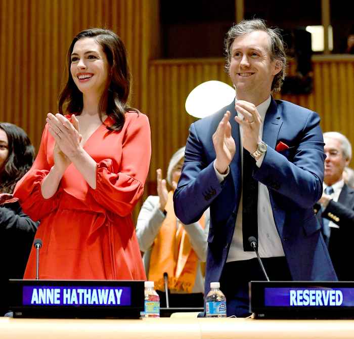 UN Women Goodwill Ambassador Anne Hathaway, with husband Adam Shulman (R) speaks at the UN International Women's Day commemoration with UN officials, gender experts and activists, private sector and celebrities at the United Nations Headquarters on March 8, 2017 in New York.