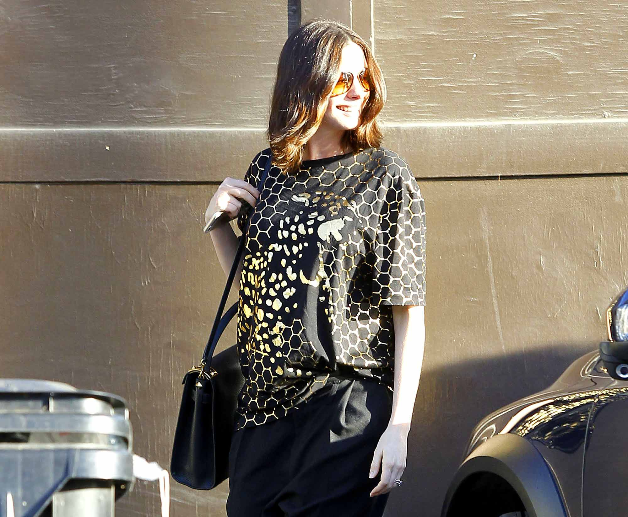 Pregnant Anne Hathaway is spotted leaving a friend's house in Echo Park, California on December 02, 2015.