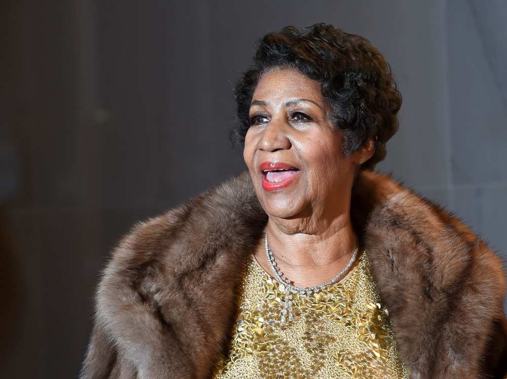 Aretha Franklin poses on the red carpet before the 38th Annual Kennedy Center Honors December 6, 2015 in Washington, DC.