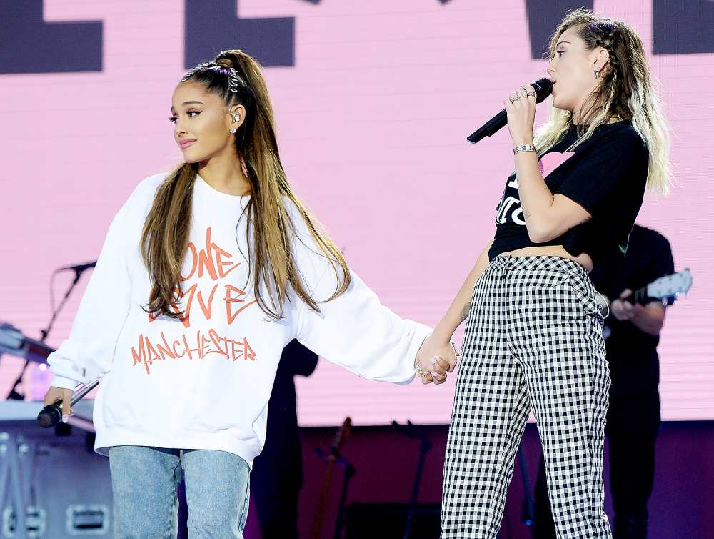 Ariana Grande and Miley Cyrus perform on stage during the One Love Manchester Benefit Concert at Old Trafford Cricket Ground on June 4, 2017 in Manchester, England.