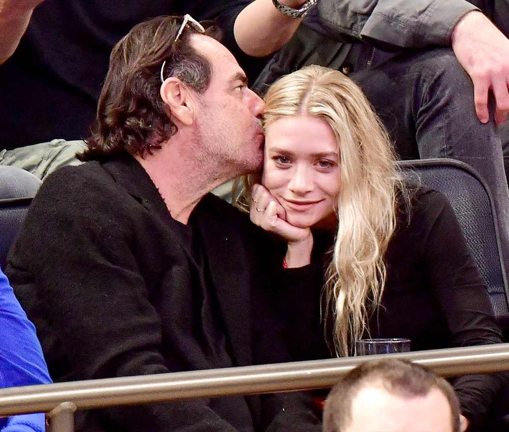 Ashley Olsen and Richard Sachs attend the New York Knicks vs. Brooklyn Nets game at Madison Square Garden on Nov. 9, 2016, in New York City.