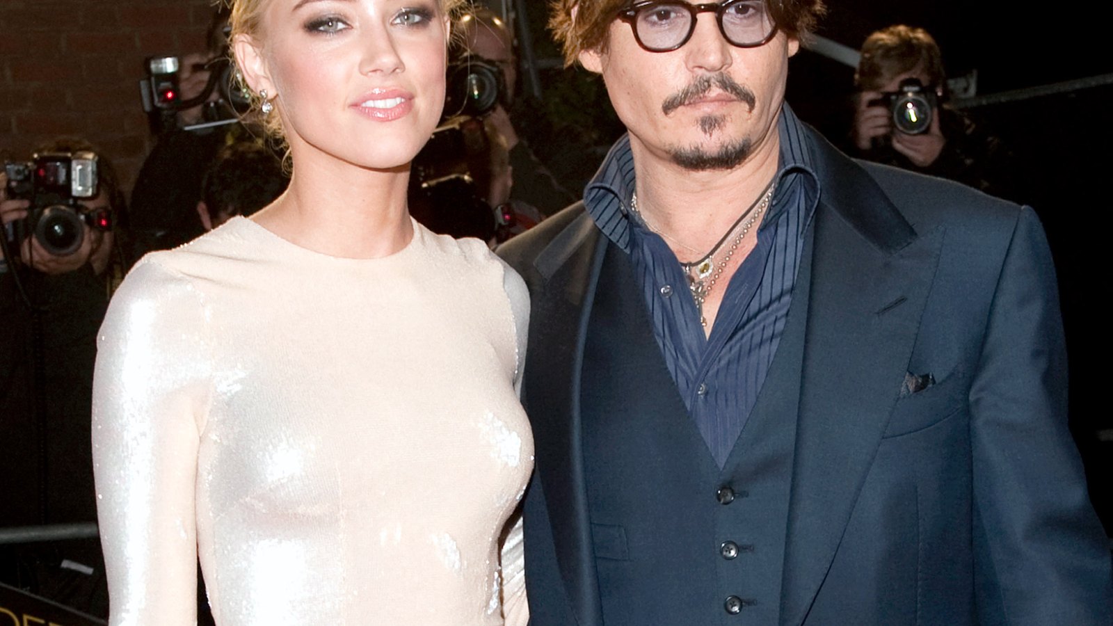 Amber Heard and Johnny Depp at the "Rum Diary" premiere