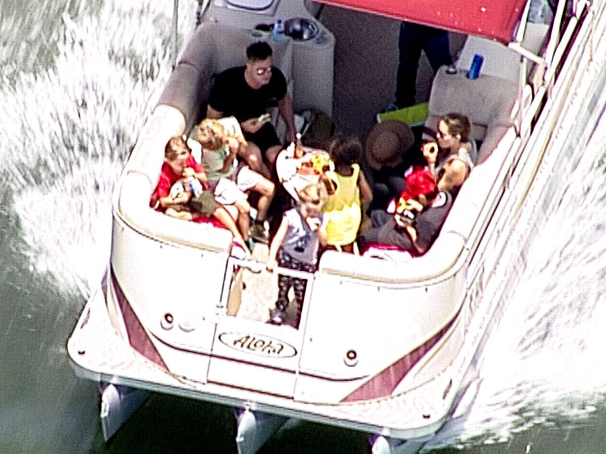 Brad Pitt and Angelina Jolie boating on the Coomera River in Australia