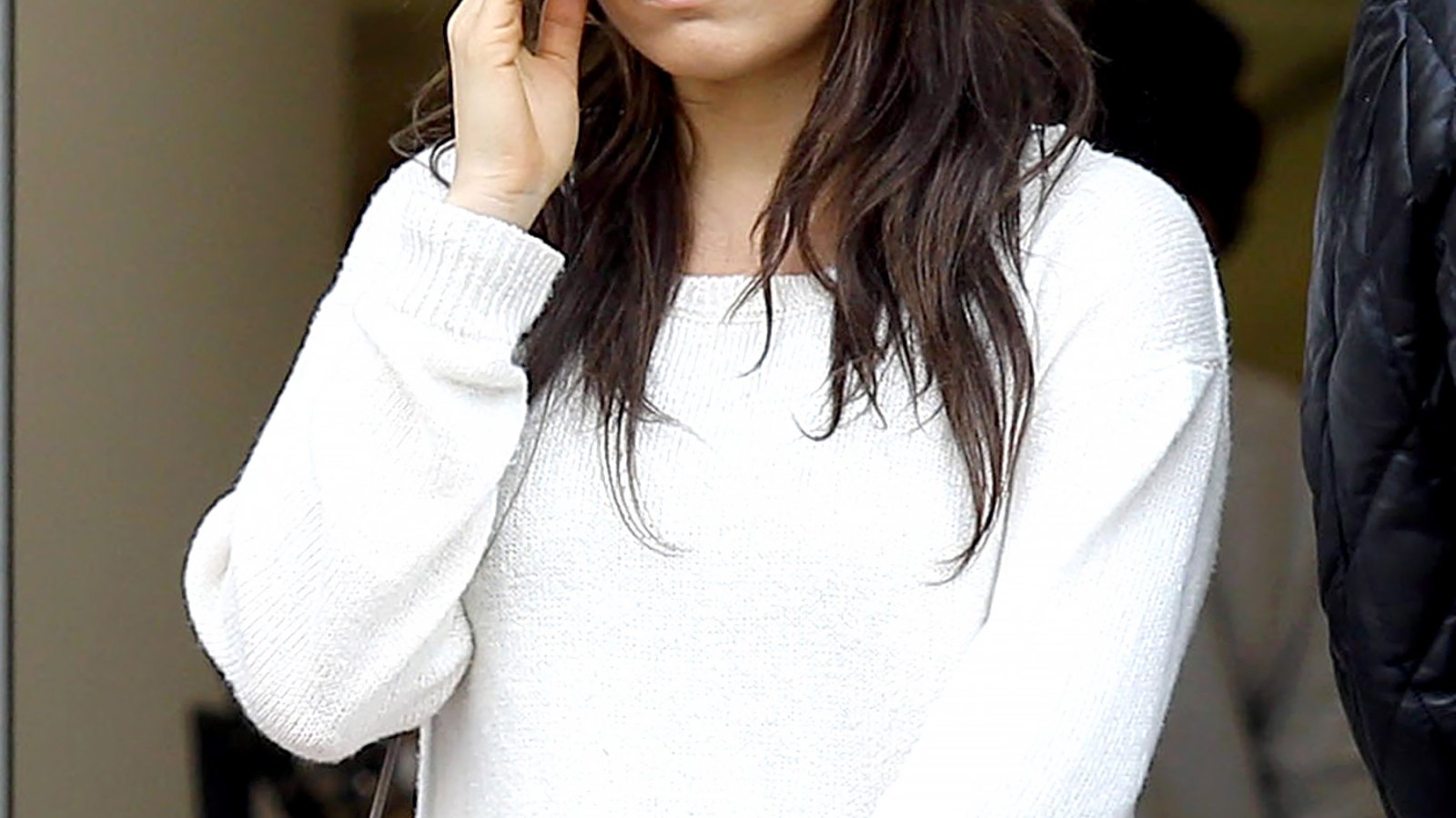Mila Kunis shows off her new engagement ring on Feb. 27, 2014