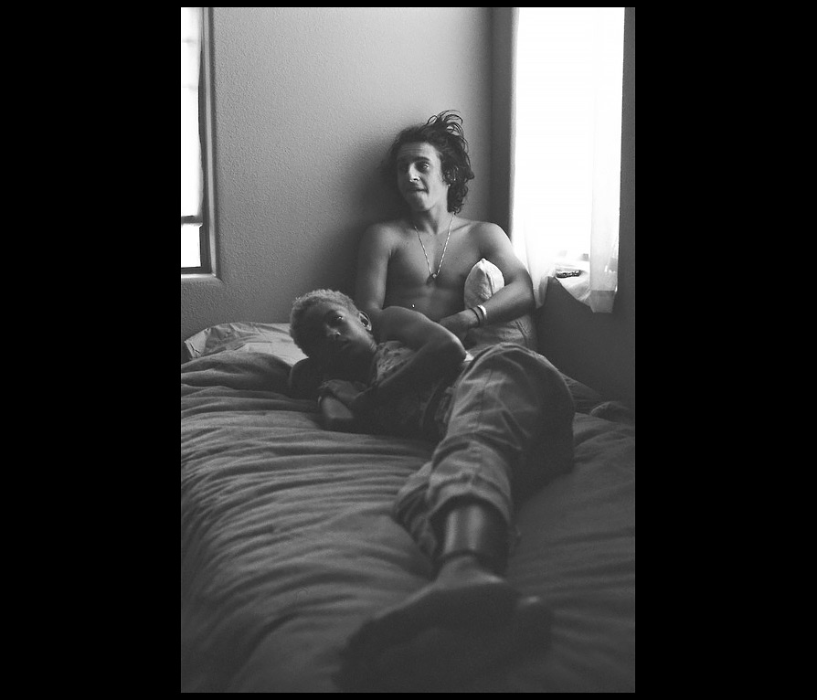 Moises Arias and Willow Smith lying on a bed shared on social media