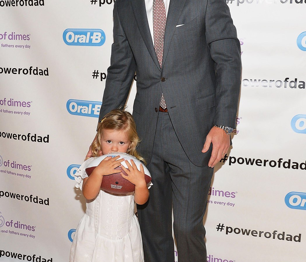 Eli Manning and his daughter Ava