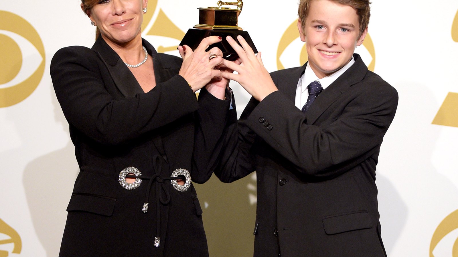 Melissa Rivers, Son Cooper Accept Grammy Award on Behalf of Late Joan