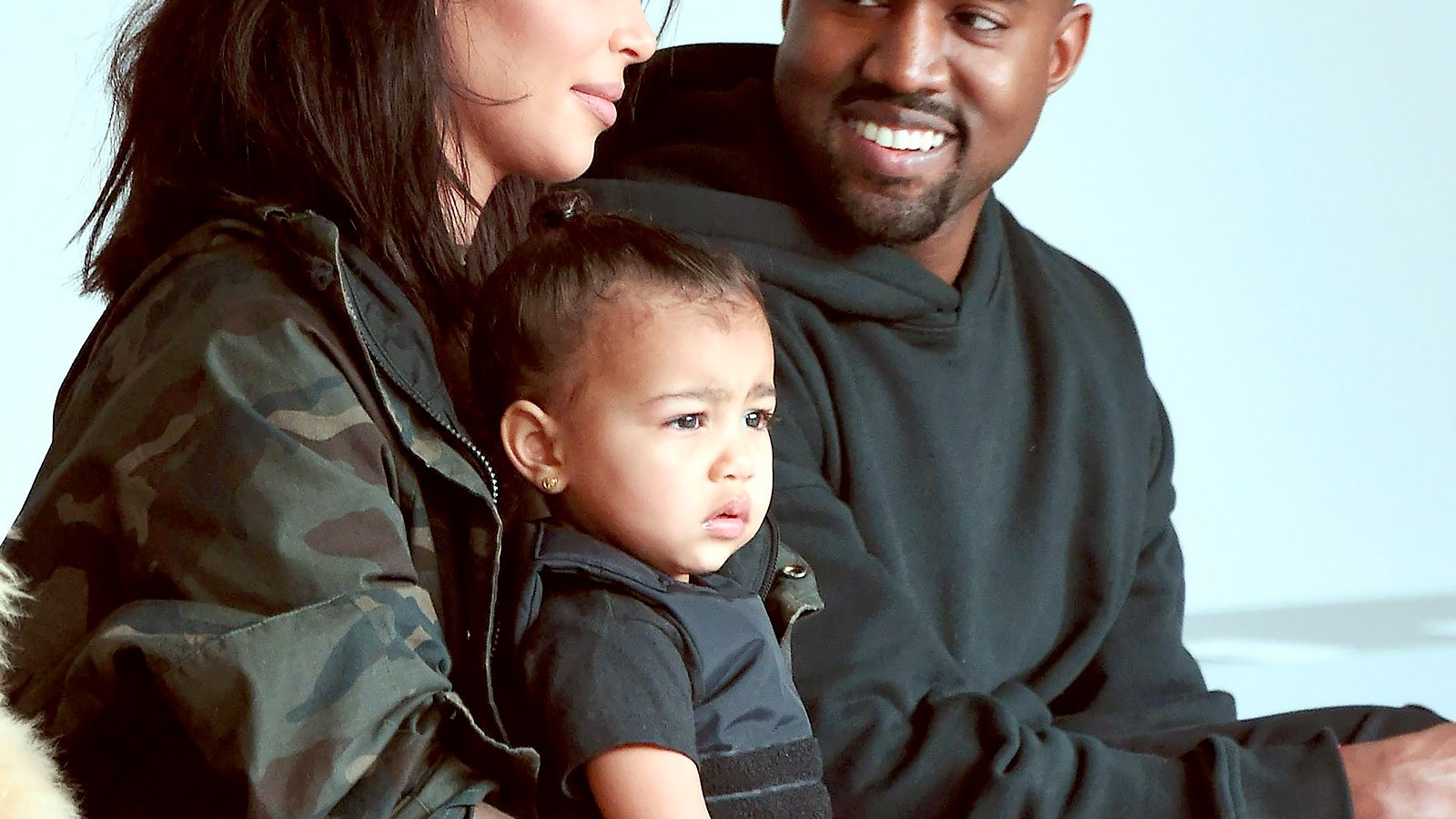 Kim Kardashian, North West and Kanye West attend the adidas show