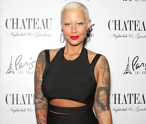 Amber Rose Goes Topless, Shows Off Tan Lines in Sexy Pool Pic