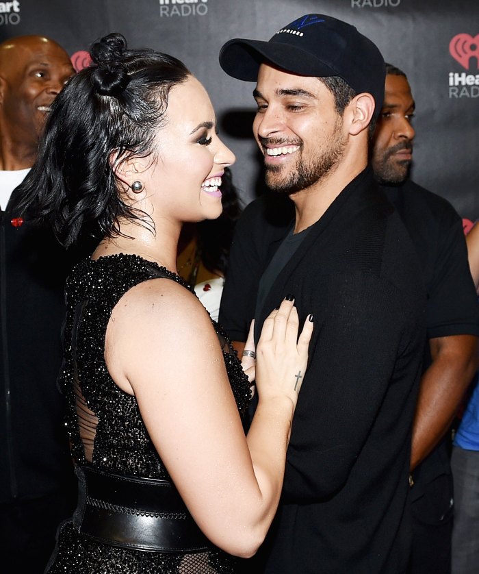 Demi Lovato and Wilmer Valderrama attend the 2015 iHeartRadio Music Festival.