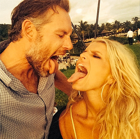 eric johnson and jessica simpson sticking out tongues
