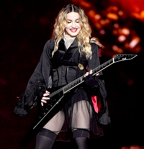 Madonna playing guitar