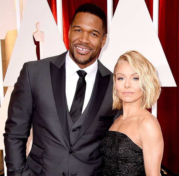 Michael Strahan and Kelly Ripa attend the 87th Annual Academy Awards.
