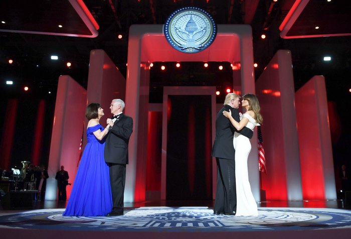 US President Donald Trump and the first lady Melania Trump dance with Vice Presidant Mike Pence and Karen at the Liberty Ball at the Washington DC Convention Center following Donald Trump's inauguration as the 45th President of the United States, in Washington, DC, on January 20, 2017.
