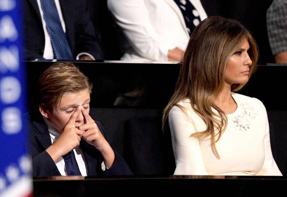 Barron Trump and Melania Trump listen to Republican presidential candidate Donald Trump deliver his speech on the fourth day of the Republican National Convention on July 21, 2016 at the Quicken Loans Arena in Cleveland, Ohio.