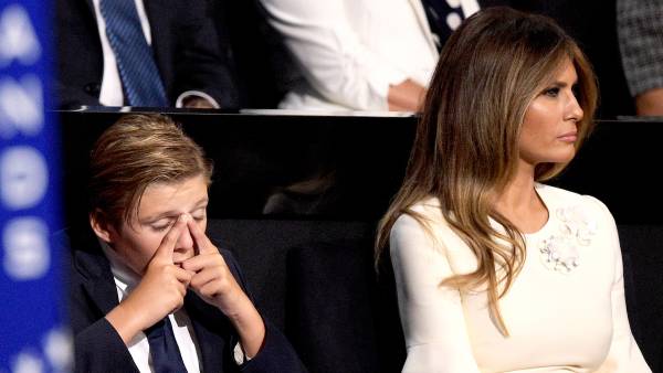 Barron Trump and Melania Trump listen to Republican presidential candidate Donald Trump deliver his speech on the fourth day of the Republican National Convention on July 21, 2016 at the Quicken Loans Arena in Cleveland, Ohio.