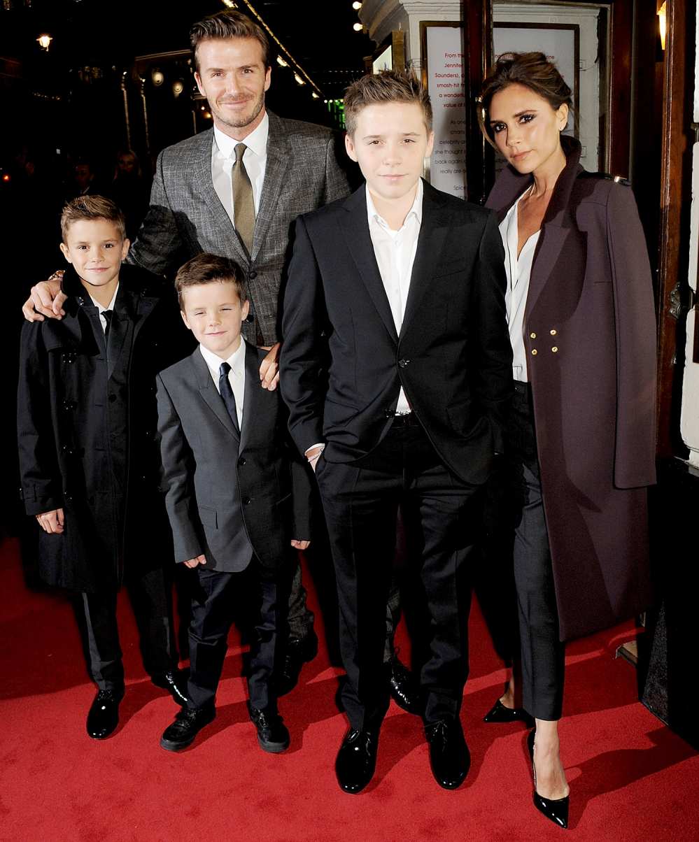 David Beckham and Victoria Beckham with children Romeo, Cruz and Brooklyn arrive at the Gala Press Night performance of 'Viva Forever' at the Piccadilly Theatre on December 11, 2012 in London, England.