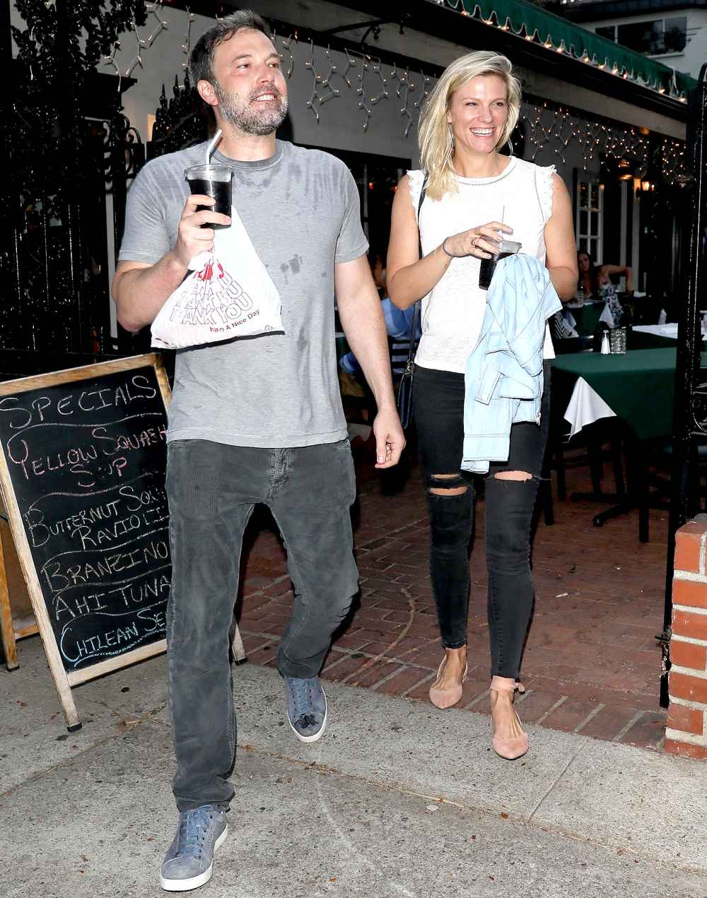 Ben Affleck exits the Beech Street Cafe restaurant after having some pizza with Lindsay Shookus on July 10, 2017.