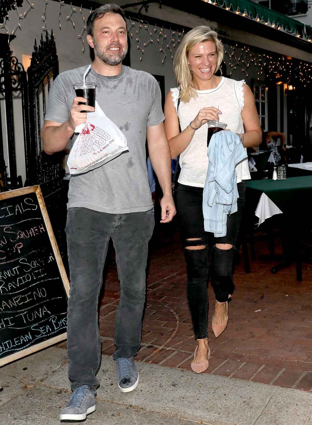 Ben Affleck exits the Beech Street Cafe restaurant after having some pizza with Lindsay Shookus on July 10, 2017.