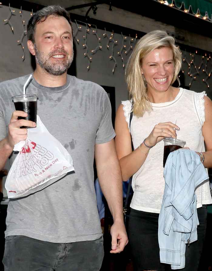 Ben Affleck looks extremely happy exiting Beech Street Cafe restaurant after having some pizza with new girlfriend Lindsay Shookus on July 10, 2017.