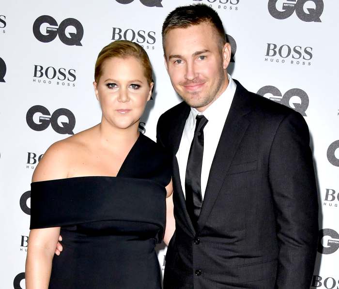 Amy Schumer and Ben Hanisch arrive for GQ Men Of The Year Awards 2016 at Tate Modern on September 6, 2016 in London, England.