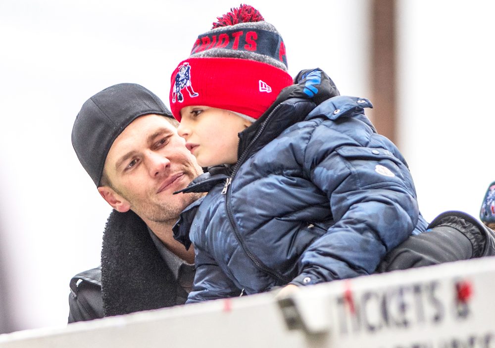 Tom Brady of the New England Patriots celebrates with his son Benjamin during the Super Bowl victory parade on February 7, 2017 in Boston, Massachusetts.